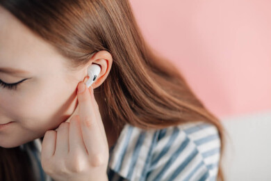Hvordan koble til AirPods