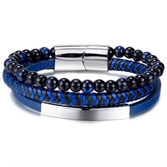 Blått armbånd med lær og perler. Blått armbånd med lær og perler.