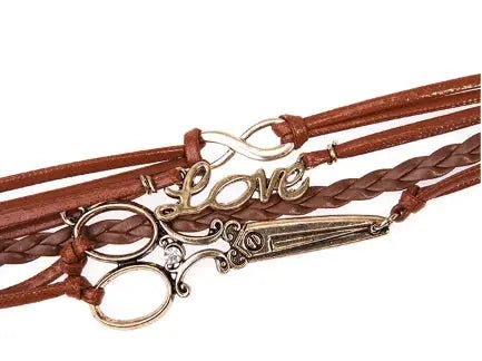 Qelton Armbånd Saks Qelton Armbånd brun med saks Qelton Armbånd Saks Qelton Armbånd brun med saks