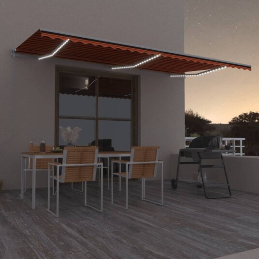vidaXL Automatisk markise med vindsensor og LED 600x300cm oransje/brun
