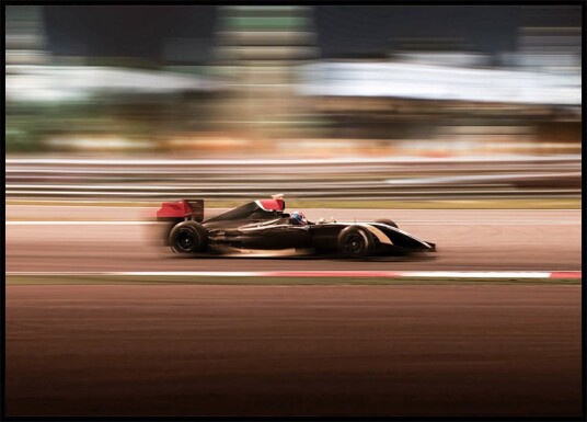 F1 Car in Motion Plakat Plakat / 100x150cm