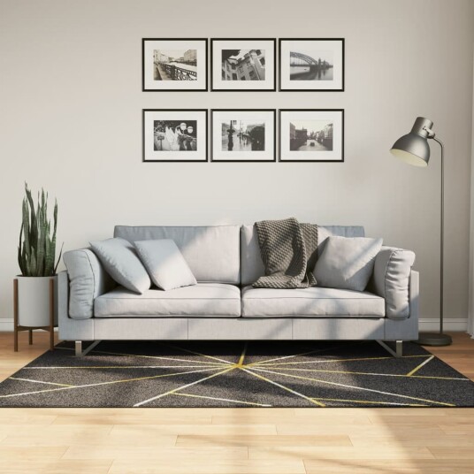 Teppe vaskbart svart og gull 120x180 cm sklisikker