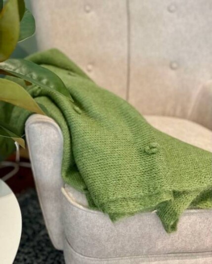 Pledd i mohair i lekker grønnfarge.