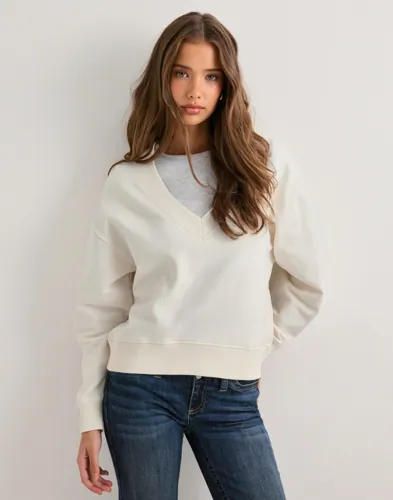 Nelly   Hvit   V Neck Barrel Sweat