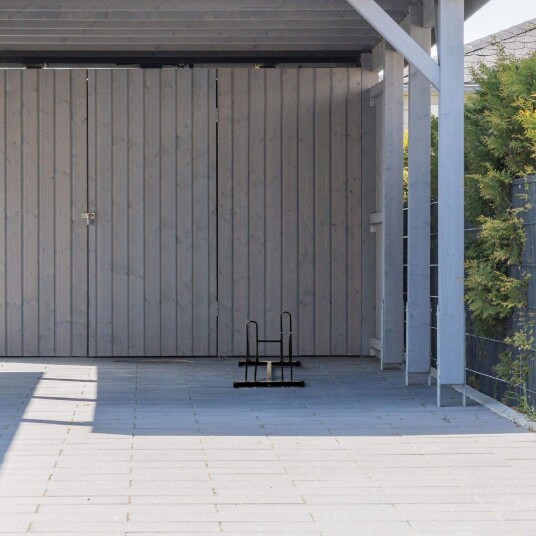 Svart sykkelstativ for 2 sykler