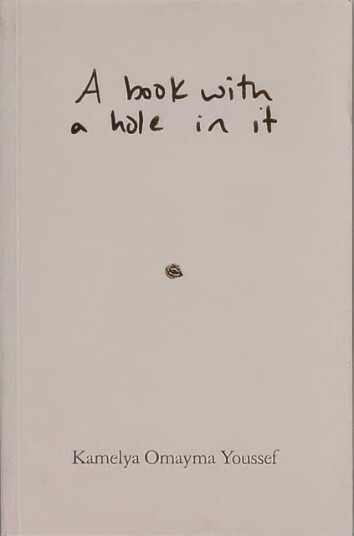 A book with a hole in it