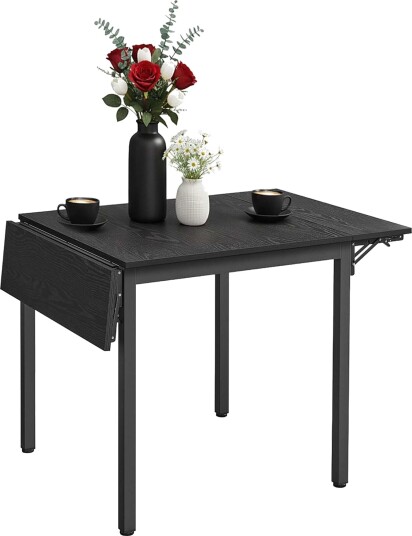 Sammenleggbart spisebord for 2–4 plassbesparende design Sammenleggbart spisebord for 2–4 plassbesparende design