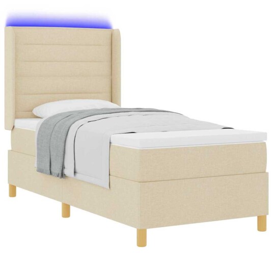 Boksfjær Seng med LED lysstrimler Krem 90 x 190 cm stoff