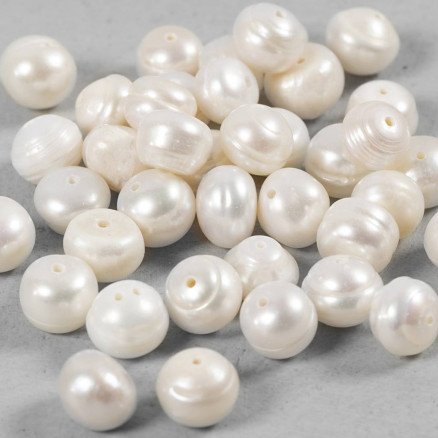 Diverse Ferskvannsperler dia 4 mm hullstr 1 mm Perforert på tvers perlemor 40 stk 1 pk