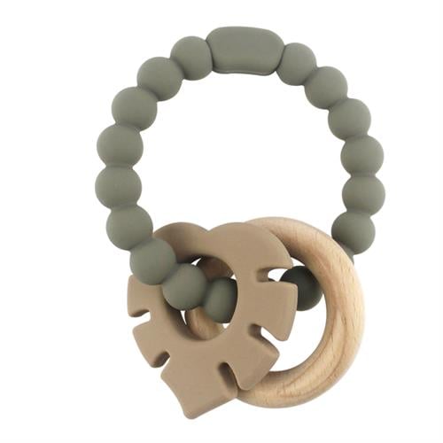 Magni Teether bracelet silicone with wooden ring and leaves appendix Grey 5544 Magni Teether bracelet silicone with wooden ring and leaves appendix Grey 5544