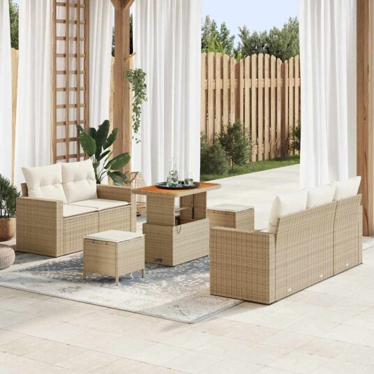 8-delt hagesofa med beige puter i poly rattan og akacia