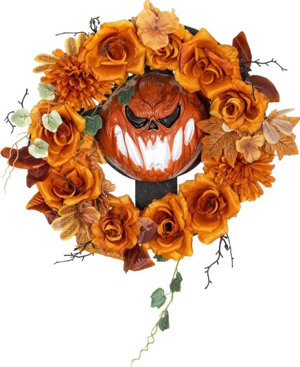 Halloween-krans, skummelt gresskar, høstblader, lyseffekter