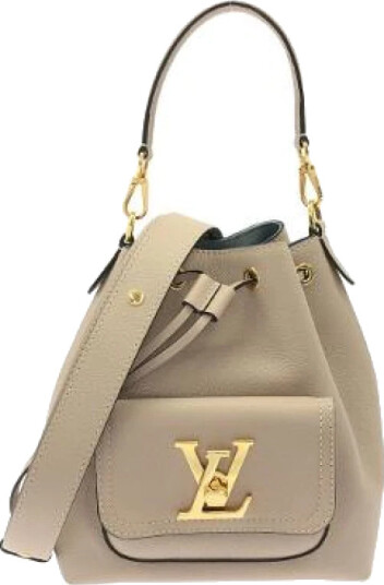 Louis Vuitton Vintage Dame Beige