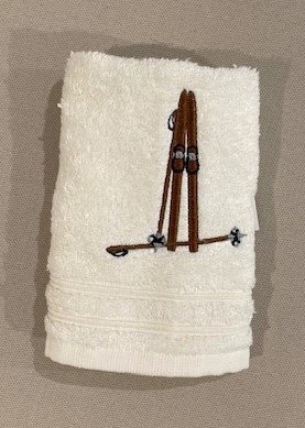 Håndkle med skimotiv 30x50cm creme