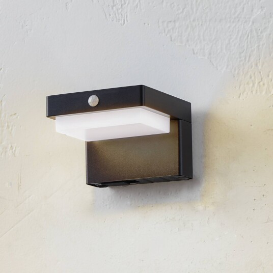 Lindby LED-vegglampe Eleazar, svart, aluminium, sensor Lindby LED-vegglampe Eleazar, svart, aluminium, sensor