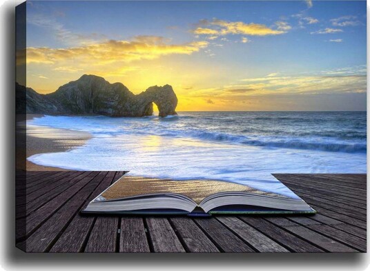 Lerretsbilde Åpen bok med en strand og solnedgang i bakgrunnen Blå / Gyllen / Beige
