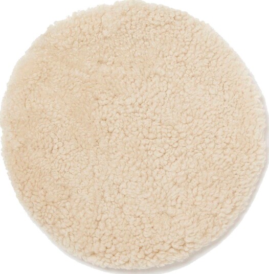 Skinnwille Saueskinnspute rund Curly Beige
