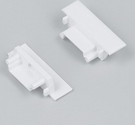 1 stk. Endestykke GROOVE14.V2 Med hull hvit 1 stk. Endestykke GROOVE14.V2 Med hull hvit