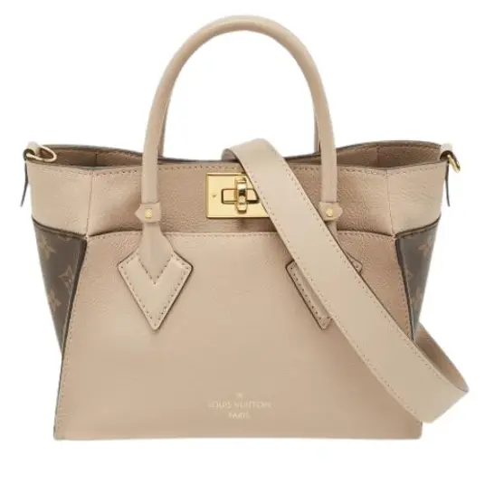 Louis Vuitton Vintage Dame Beige