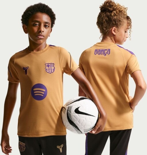 Barcelona Trenings T skjorte Dri fit Strike Gull/svart/lilla Barn Nike størrelse S: 128 137 cm