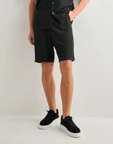 Selected Homme Slhloose Plisse Shorts Ex Joggeshorts Svart Selected Homme Slhloose Plisse Shorts Ex Joggeshorts Svart