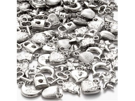 Diverse Sølvcharms str 15 20 mm hullstr 3 mm 80g ca 178 stk
