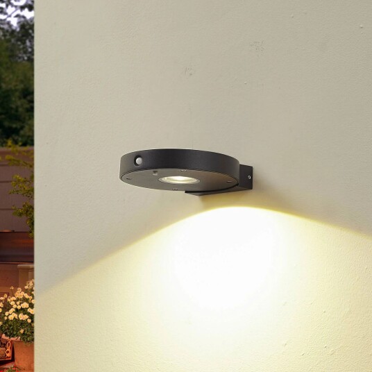 Lucande LED-solcellelampe Tavon rund svart sensor