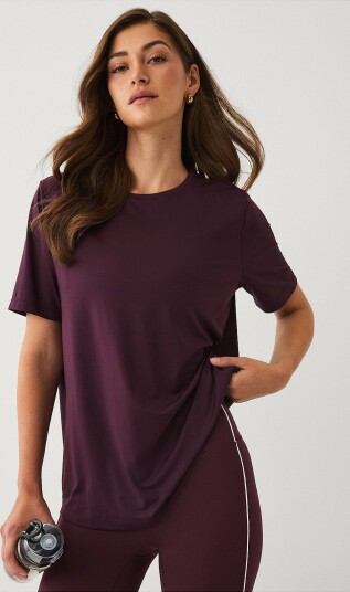 Ellos STUDIO Treningstopp Loose Top Core SS Lilla