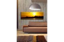Lerretsbilde med LED belysning 30x90 cm Solnedgang over en bysilhuett med fugler i flukt Gull / Svart / Oransje