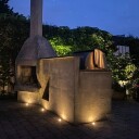 Light By Juhl betongfliser med Cosmos spotlights i messing 10x10x6 cm antrasitt