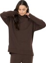 Athlecia Yunes W Turtle Neck   Brown   44