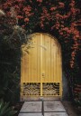 Yellow Door with Orange Flowers Plakat Plakat / 21x30cm