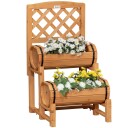 Rustikk gul plantekasse med espalier til hagen