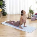 Yogamatte med posisjonslinjer og trening guide