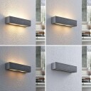 Lindby Nellie LED-betong-vegglampe, bredde 35,3 cm