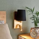 Lindby Vegglampe Aiden med LED-leselys, svart, gull