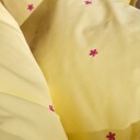 Juna Daisy sengetøy baby 70x100 cm gul