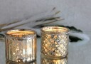 Telysholder gullfarget med stripet mønster