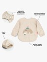 Done by Deer Sleeved Pocket Bib Celebration Sand   Beige   LENGTH FRONT:34CM.SLEEVE WIDTH:72CM