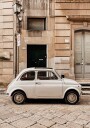 Classic Car in Urban Setting Plakat Plakat / 100x150cm