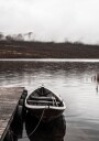 Boat In A Lake Near The Mountains Plakat Plakat / 40x50cm