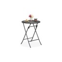 Rundt hagebord i rottinglook